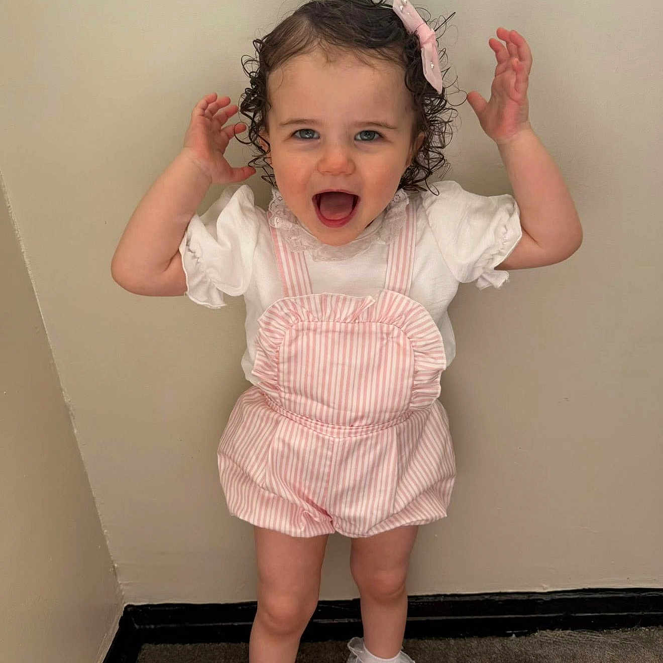 Autumn is registered to the contest to win money with this photo: accessories, baby, babylaughing, clothing, dress, face, footwear, hair, happy, head, jewelry, necklace, pants, person, photography, portrait, sandal, shoe, sitting, sleeve