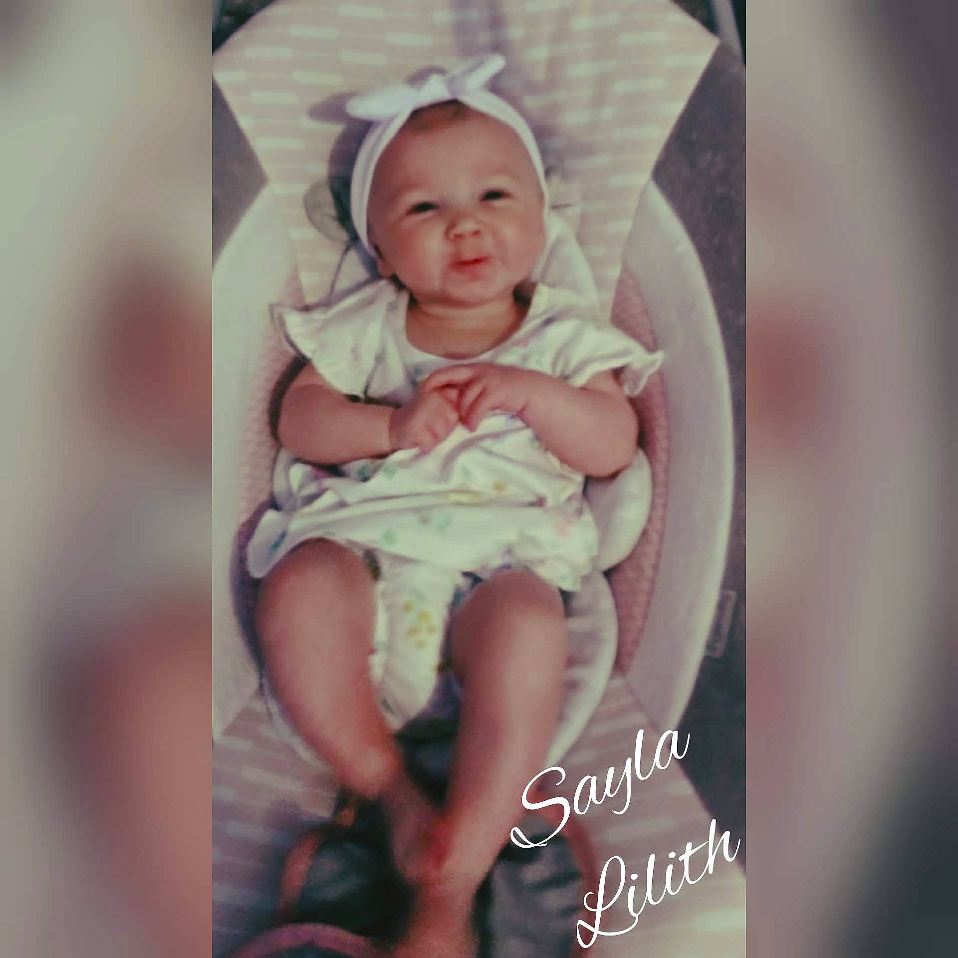 Sayla is registered to the contest to win money with this photo: baby, child, happy, person, photo_caption, photograph, photography, pink, product, skin, smile, toddler