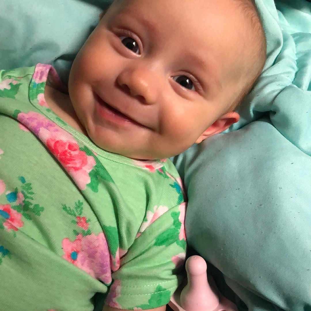 Odessa is registered to the contest to win money with this photo: architecture, baby, bed, building, clothing, cushion, face, furniture, happy, head, homedecor, hospital, laughing, newborn, person, photography, portrait, quilt, smile, t_shirt