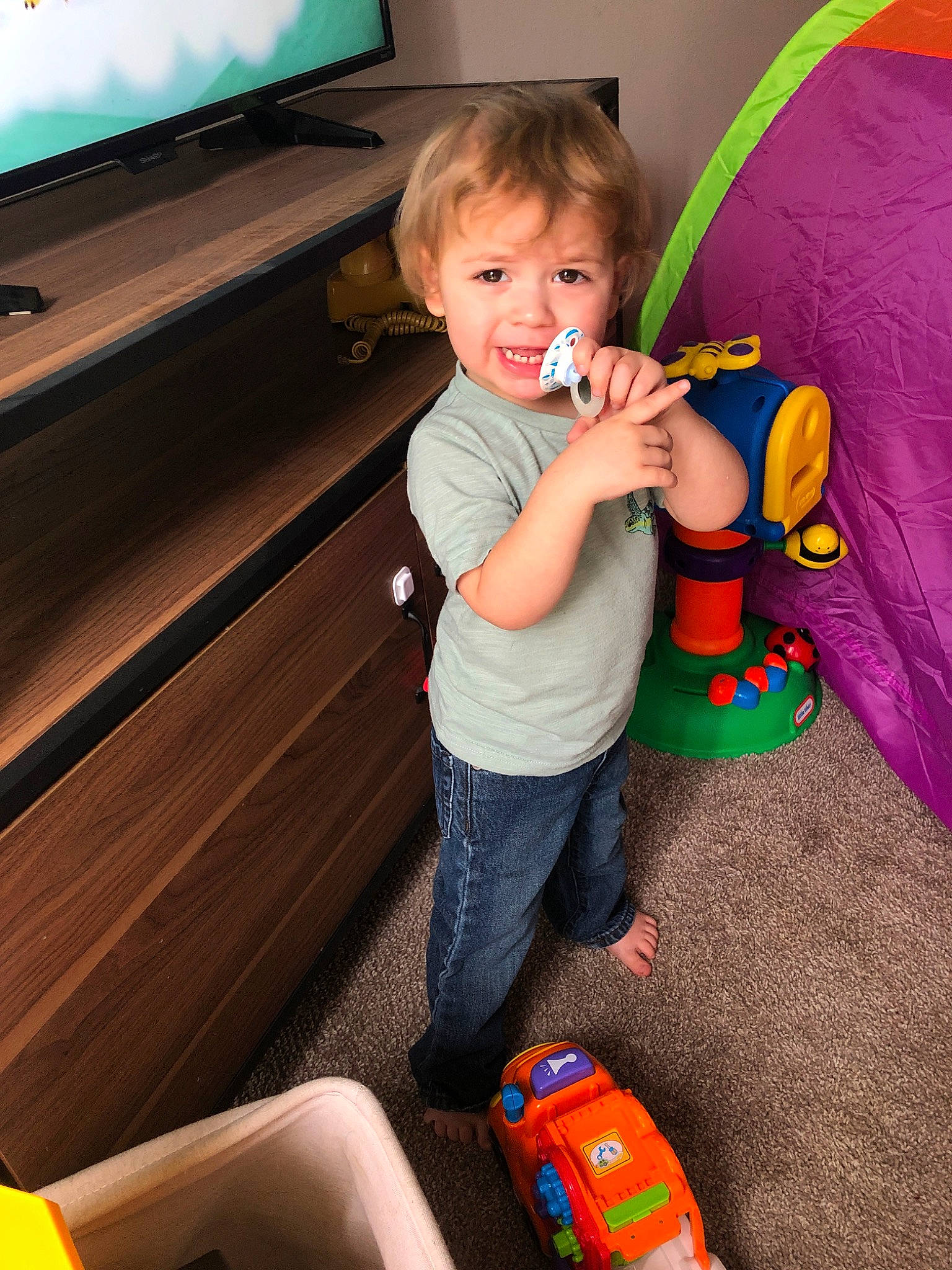 Hollis is registered to the contest to win money with this photo: baby, baby_toys, child, eye, fun, person, play, skin, toddler, toy