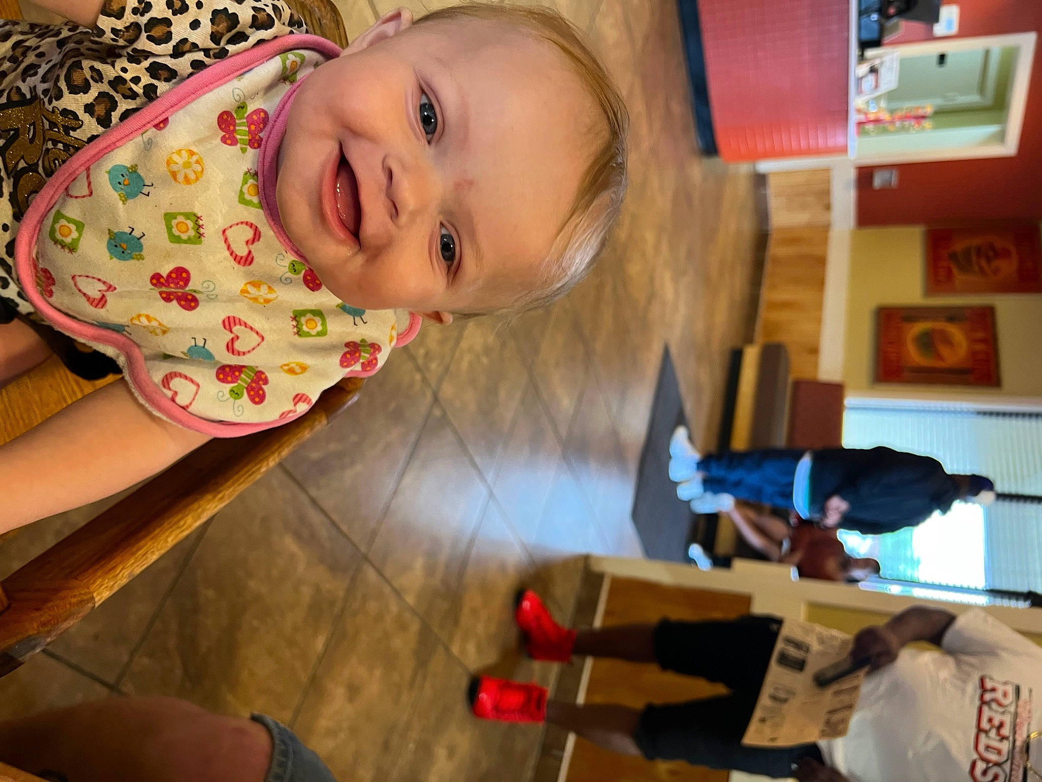 Valhela is registered to the contest to win money with this photo: baby, baby_toddler_clothing, blond, cheek, child, finger, flooring, fun, happy, head, iris, joy, mouth, nose, person, room, skin, smile, t_shirt, toddler