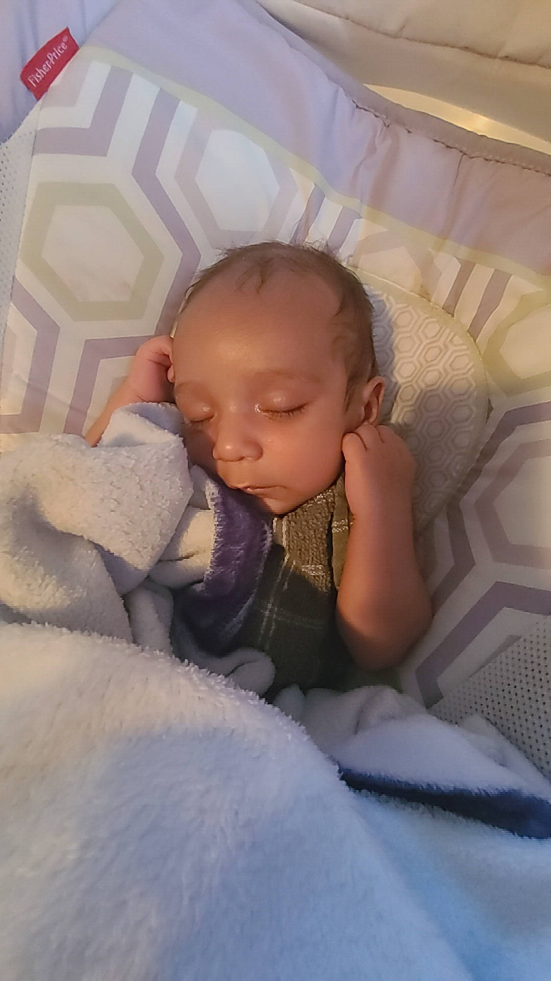 Jaden is registered to the contest to win money with this photo: baby, baby_toddler_clothing, balloon, cheek, chin, comfort, eye, eyebrow, facial_expression, finger, hairstyle, hand, happy, human_body, lip, mouth, nose, person, skin, textile