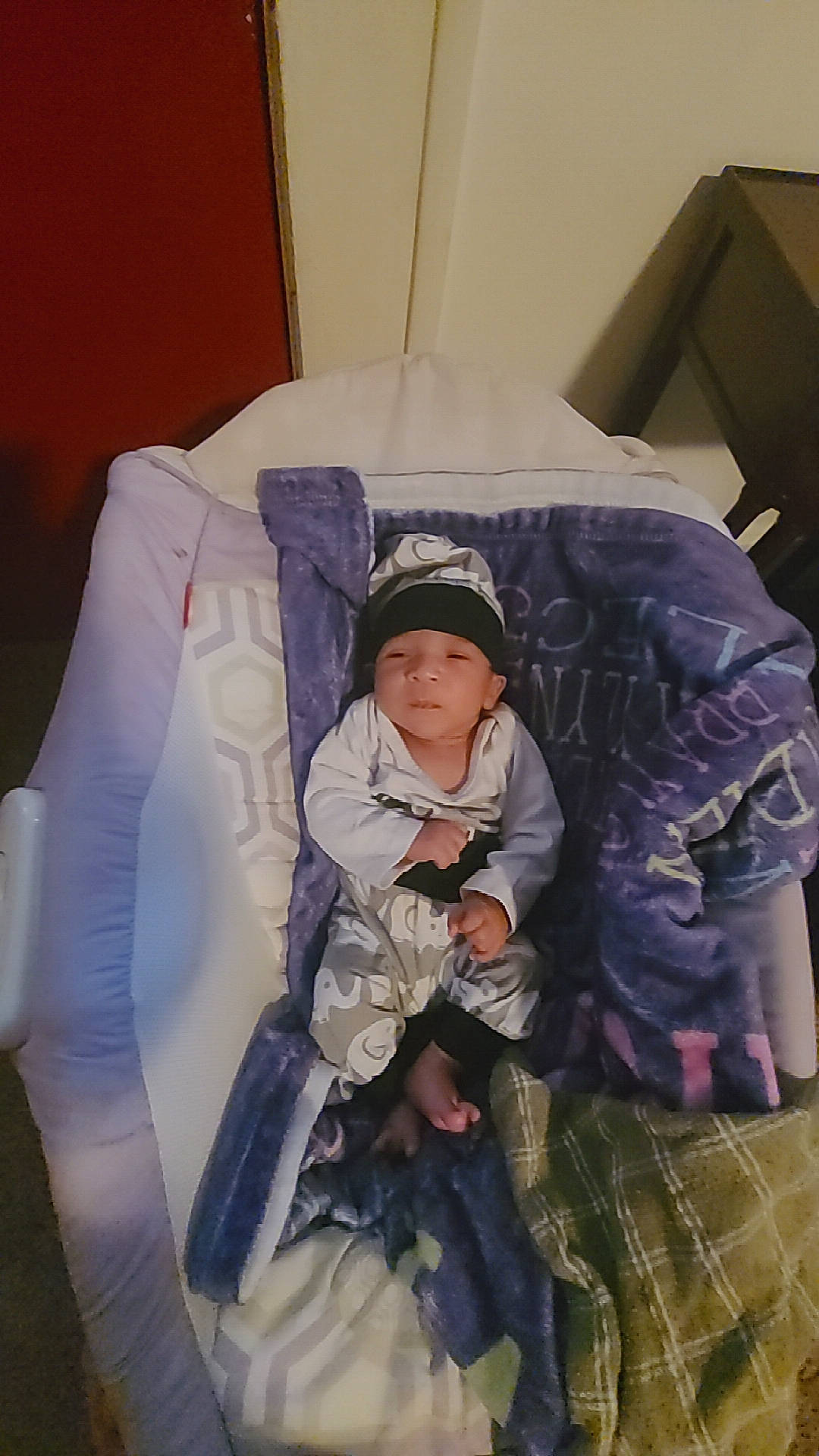 Jaden joined the competition — help win amazing prizes! baby, baby_products, chair, child, comfort, event, flooring, fun, headwear, infant_bed, linens, person, purple, room, sitting, toddler, winter