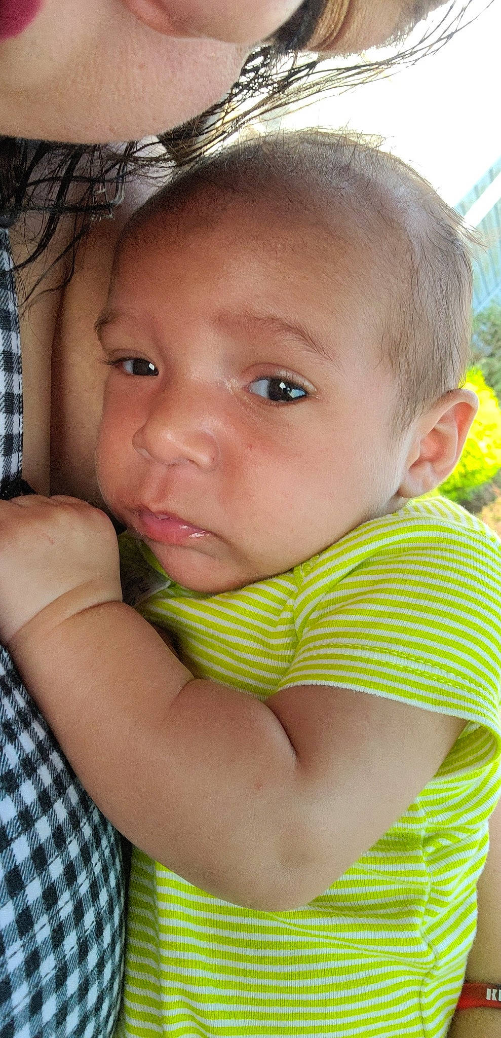 Jaden joined the competition — help win amazing prizes! baby, baby_toddler_clothing, cheek, child, chin, close_up, eyebrow, eyelash, fun, grass, hairstyle, happy, iris, lip, mouth, nose, person, sitting, skin, tartan