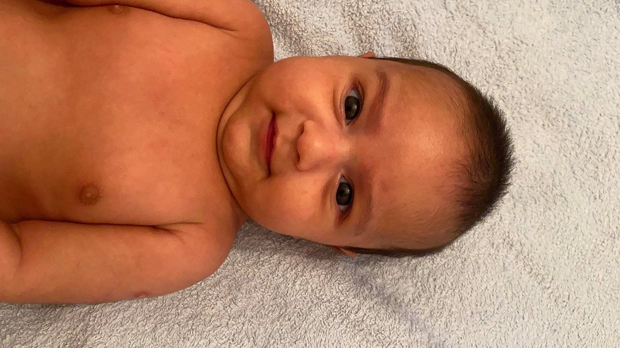 Ayan is registered to the contest to win money with this photo: abdomen, baby, barechested, cheek, chest, child, close_up, comfort, eye, eyelash, happy, human_body, iris, lip, mouth, neck, nose, person, smile, stomach