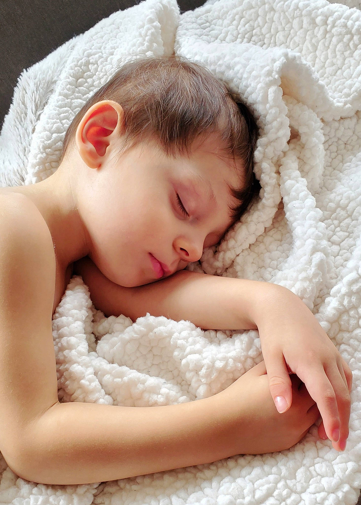 Alejandro is registered to the contest to win money with this photo: baby, baby_sleeping, baby_toddler_clothing, child, close_up, comfort, eyelash, finger, fur, gesture, happy, headgear, headpiece, linens, lip, neck, person, skin, textile, toddler