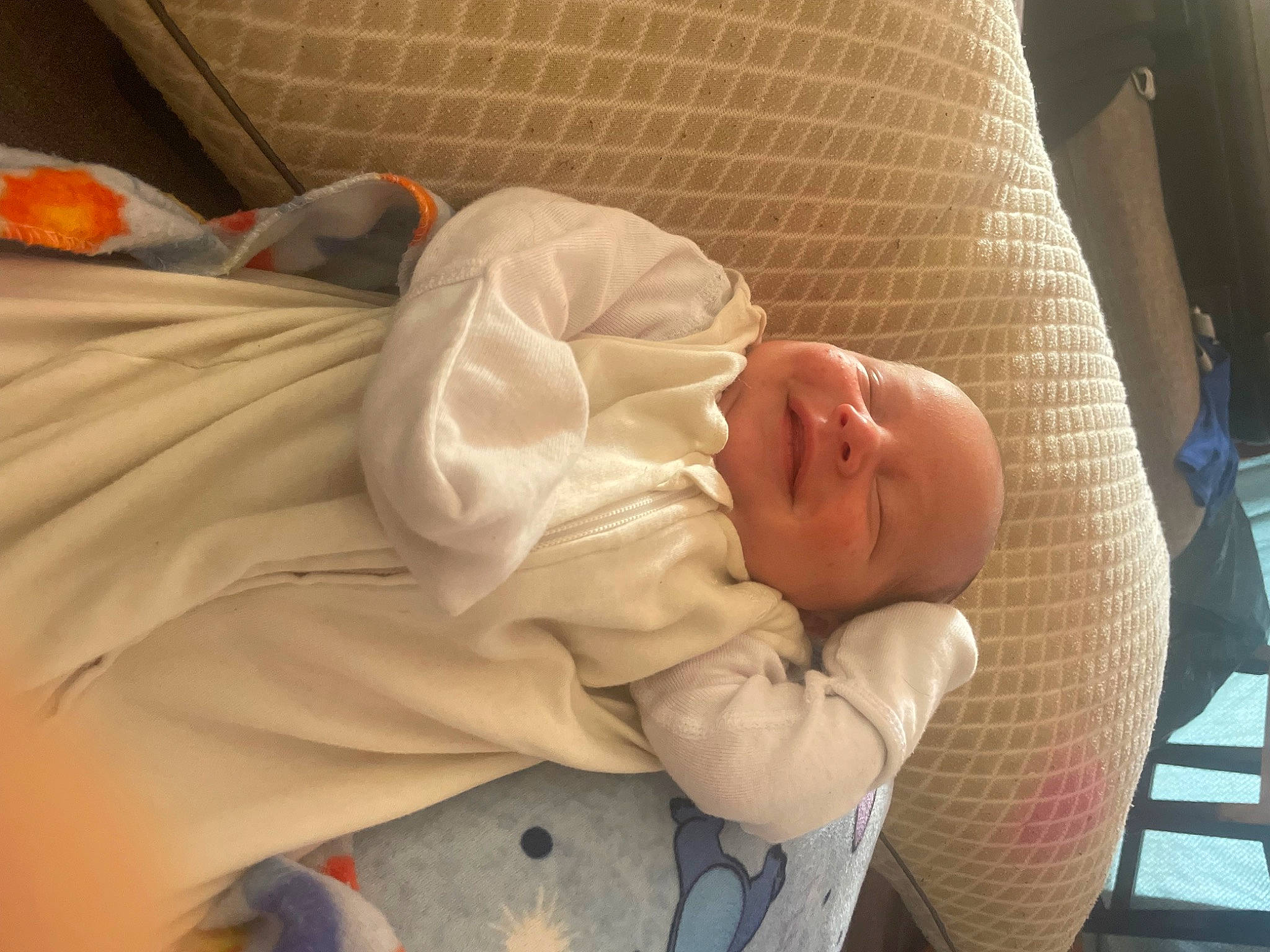 Anthony is registered to the contest to win money with this photo: baby, baby_products, baby_safety, baby_sleeping, baby_toddler_clothing, bedding, bedtime, chair, child, comfort, infant_bed, linens, nap, person, room, sitting, sleep, toddler