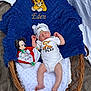 Eden a rejoint le concours — aidez-le/la à gagner de superbes lots ! baby, newborn, basket, blanket, plush_toy, mickey_mouse, onesie, hat, sleeping, soft_texture, wicker, blue_blanket, white_blanket, cute, infant, cozy, resting, toy, child, portrait