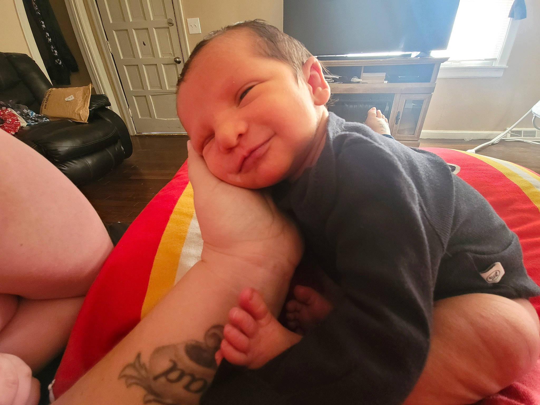 Greyson is registered to the contest to win money with this photo: arm, cheek, chest, chin, comfort, elbow, eye, finger, gesture, head, joint, knee, leg, mouth, muscle, neck, person, skin, stomach, thigh