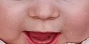 Oliver is registered to the contest to win money with this photo: baby, face, closeup, child, smiling, mouth, cheeks, clothing, zipper, fabric, eyelashes, skin, innocence, expression, portrait, young, cute, infant, happy, apparel