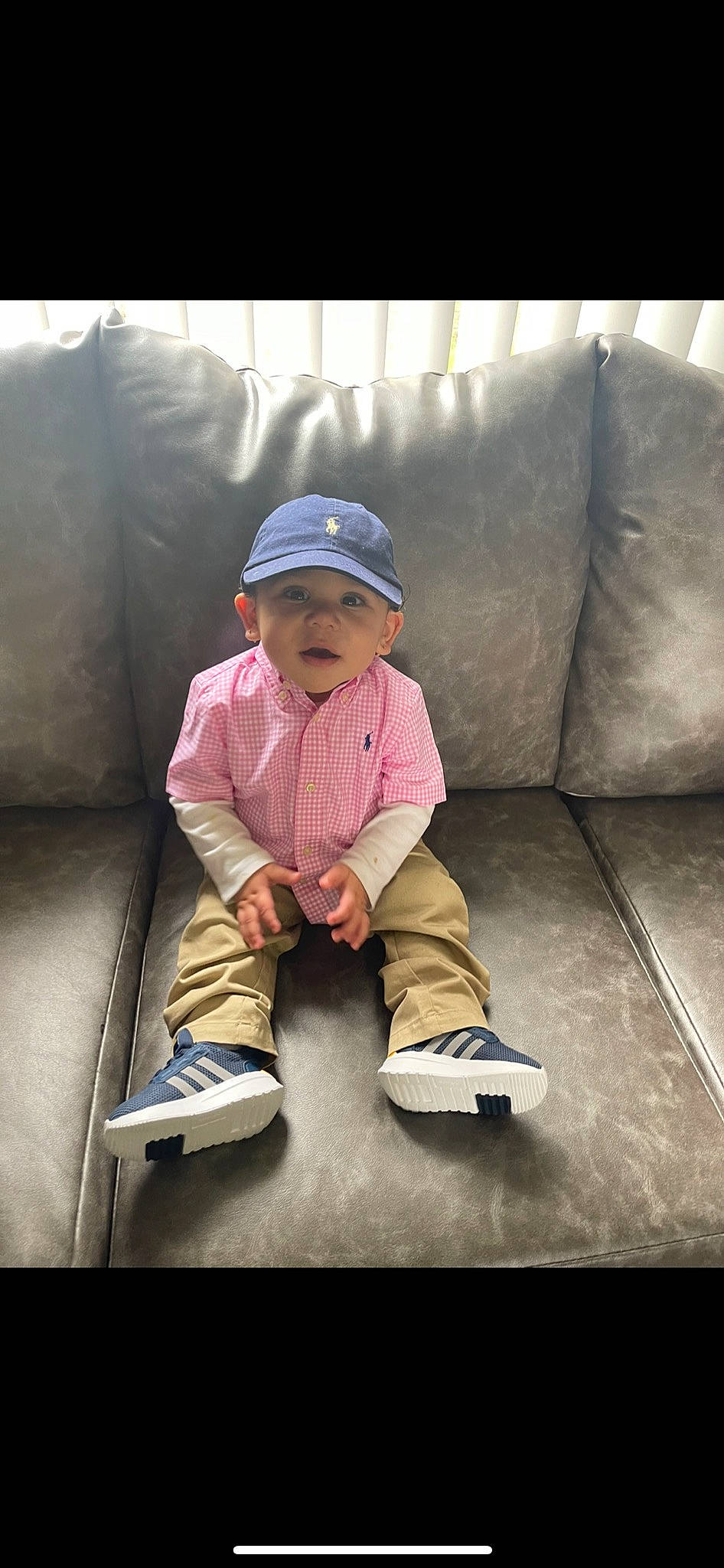 Donovan joined the competition — help win amazing prizes! baby_toddler_clothing, cap, comfort, cool, couch, fun, headwear, helmet, human_body, jacket, knee, person, personal_protective_equipment, product, recreation, rolling, shoe, sleeve, sneakers, sports_equipment