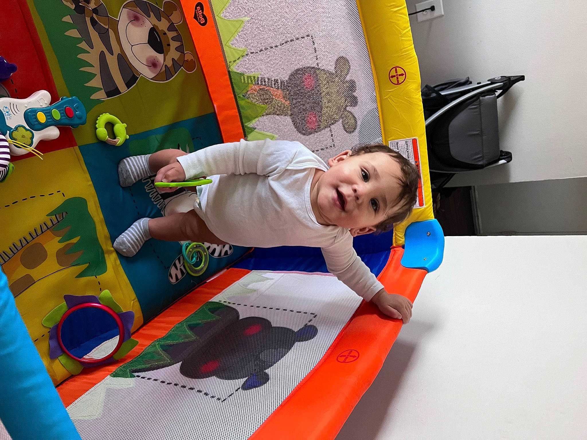 Donovan is registered to the contest to win money with this photo: baby, baby_playing_with_toys, baby_products, baby_toddler_clothing, baby_toys, bed, child, comfort, fun, games, inflatable, leisure, nursery, person, play, recreation, room, smile, t_shirt, toddler