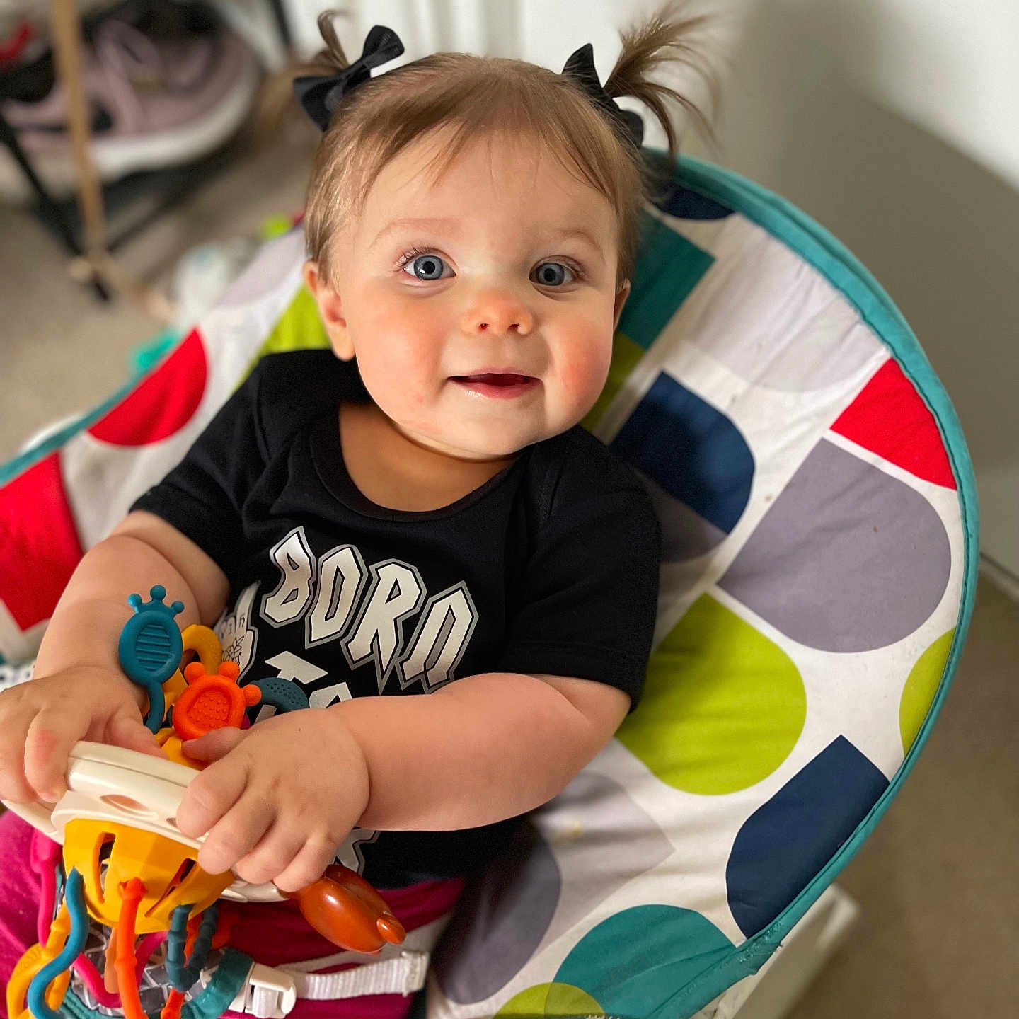 Emma joined the competition — help win amazing prizes! baby, bodypart, chair, clothing, couch, cushion, face, finger, furniture, hand, head, homedecor, machine, person, photography, portrait, sitting, t_shirt, toy, wheel