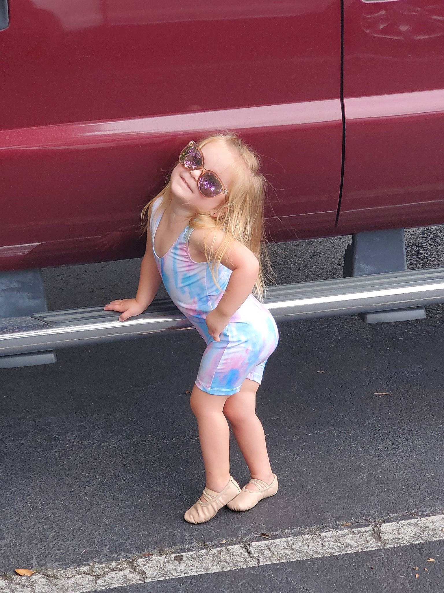 Parker joined the competition — help win amazing prizes! asphalt, automotive_design, automotive_exterior, automotive_lighting, automotive_tire, automotive_wheel_system, bumper, car, dress, eyewear, grille, hood, leg, motor_vehicle, person, pink, sunglasses, thigh, vehicle, vehicle_door