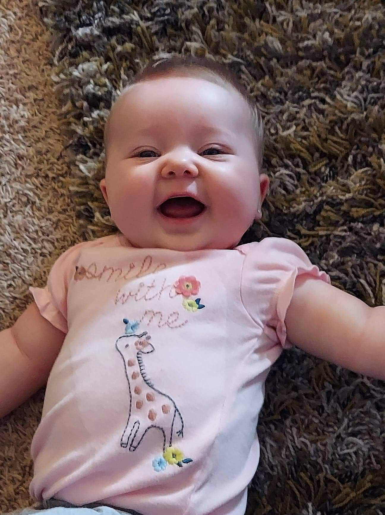 Ayvah joined the competition — help win amazing prizes! baby, baby_laughing, baby_toddler_clothing, cheek, child, eye, face, finger, grass, happy, head, lip, mammal, mouth, nose, people_in_nature, person, skin, sleeve, smile