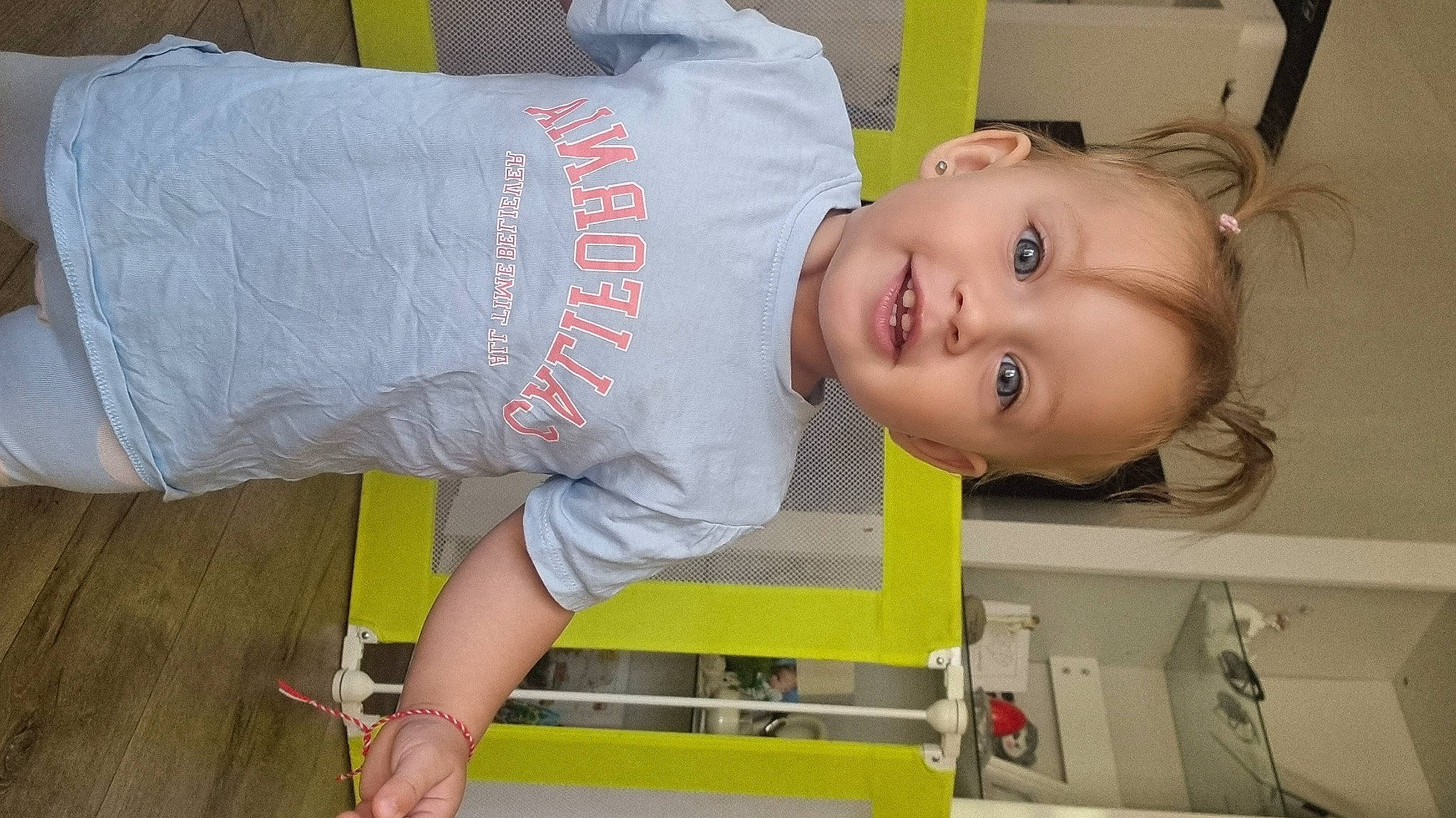 Aya joined the competition — help win amazing prizes! baby, baby_products, baby_toddler_clothing, cheek, child, elbow, flooring, fun, happy, person, sleeve, smile, t_shirt, toddler, wood, yellow