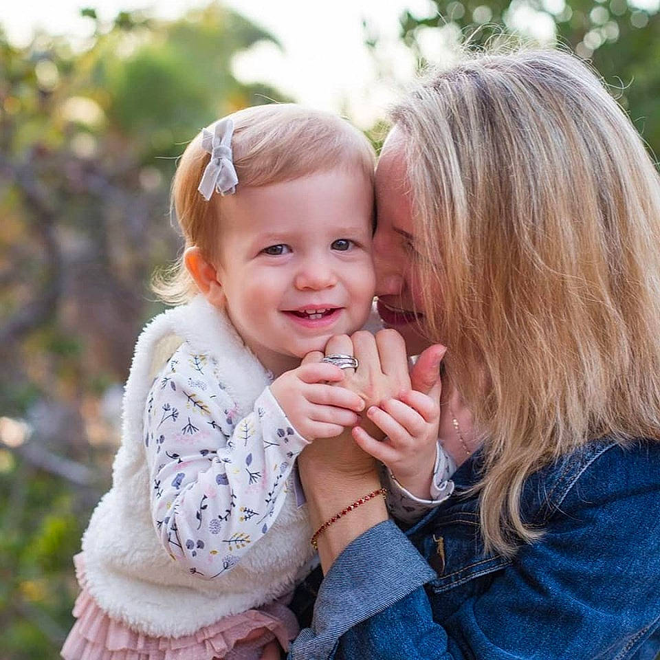 Linnea is registered to the contest to win money with this photo: baby, blond, cheek, child, child_model, daughter, finger, fun, gesture, happy, interaction, joy, mother, people, person, photograph, photography, play, portrait_photography, sibling