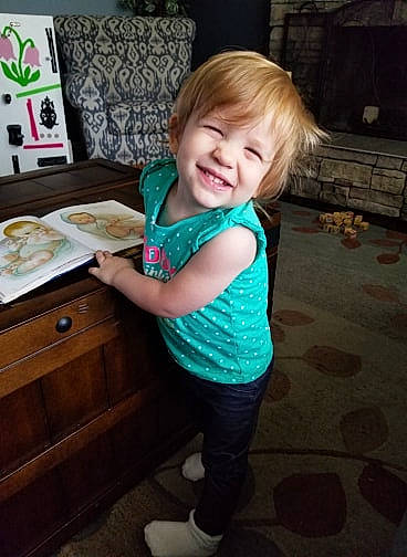 Linnea joined the competition — help win amazing prizes! baby, cheek, child, dress, joy, pattern, person, play, skin, sleeve, smile, standing, t_shirt, toddler