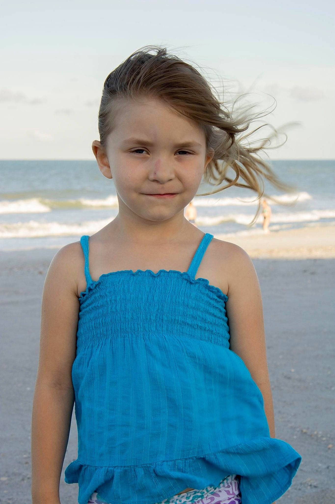 Tinslee is registered to the contest to win money with this photo: aqua, azure, beach, clothing, electric_blue, eye, face, flash_photography, fun, hair, happy, iris, joy, neck, person, shoulder, skin, sky, sleeve, travel