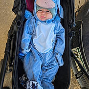 Jerald joined the competition — help win amazing prizes! baby, bed, bonnet, cap, clothing, face, footwear, furniture, hat, head, hood, hoodie, knitwear, person, photography, portrait, shoe, stroller, sweater, sweatshirt