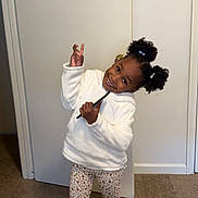 Kalani is registered to the contest to win money with this photo: bodypart, child, clothing, coat, door, face, female, finger, footwear, girl, hand, happy, head, longsleeve, pants, person, photography, portrait, shoe, sleeve