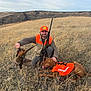 Roscoe joined the competition — help win amazing prizes! man, dog, hunting, grass, field, outdoor, animal, pet, bird, pheasant, hunter, orange_vest, hat, gun, smile, nature, sky, hill, happy, companion