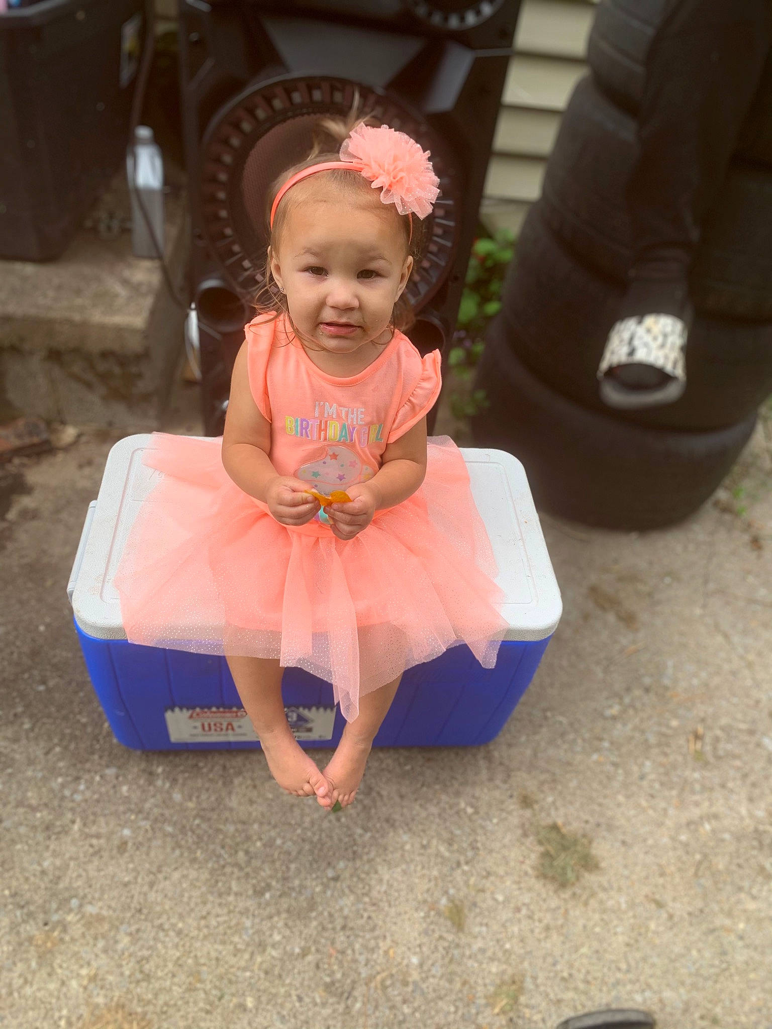 Ariel joined the competition — help win amazing prizes! automotive_tire, baby, baby_products, baby_toddler_clothing, child, dress, fashion_accessory, fun, grass, happy, human_leg, jewellery, leisure, person, pink, play, recreation, sitting, smile, toddler