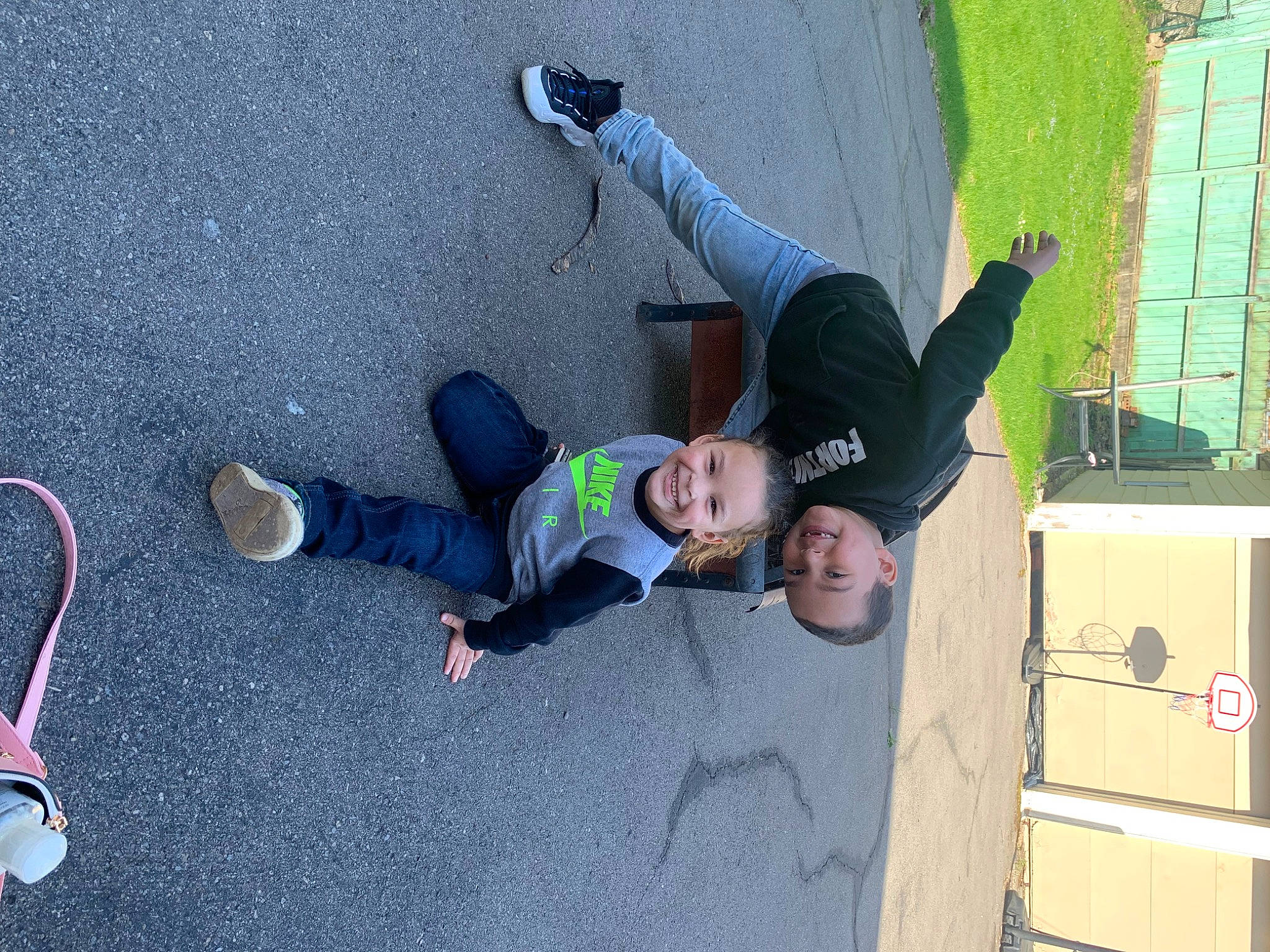 Justin is registered to the contest to win money with this photo: adventure, asphalt, box, carton, concrete, electric_blue, fun, human_body, jeans, joint, joy, leg, leisure, outdoor_shoe, person, recreation, shipping_box, shoe, sneakers, t_shirt