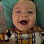 Shawn joined the competition — help win amazing prizes! baby, child, smiling, happy, face, closeup, infant, cushion, pattern, clothing, yellow, brown, toy_story, indoor, portrait, cute, young, person, apparel, babywear