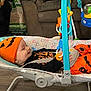 Shawn joined the competition — help win amazing prizes! baby, infant, halloween, pumpkin_hat, orange_clothing, baby_rocker, toy, smiling, indoor, floor, furniture, couch, playtime, child, cute, costume, holiday, home, happy, toddler