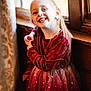 child, girl, smile, red_dress, velvet, stars, long_hair, window, wooden, curtain, indoor, portrait, happy, light, sunlight, sparkle, earrings, posing, cute, fashion