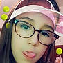casual_clothing, child, digital_filter, face, fun, girl, glasses, headshot, indoors, long_hair, person, playful, portrait, selfie, smiling, tennis_balls, tongue_out, virtual_effects, visor_hat, young