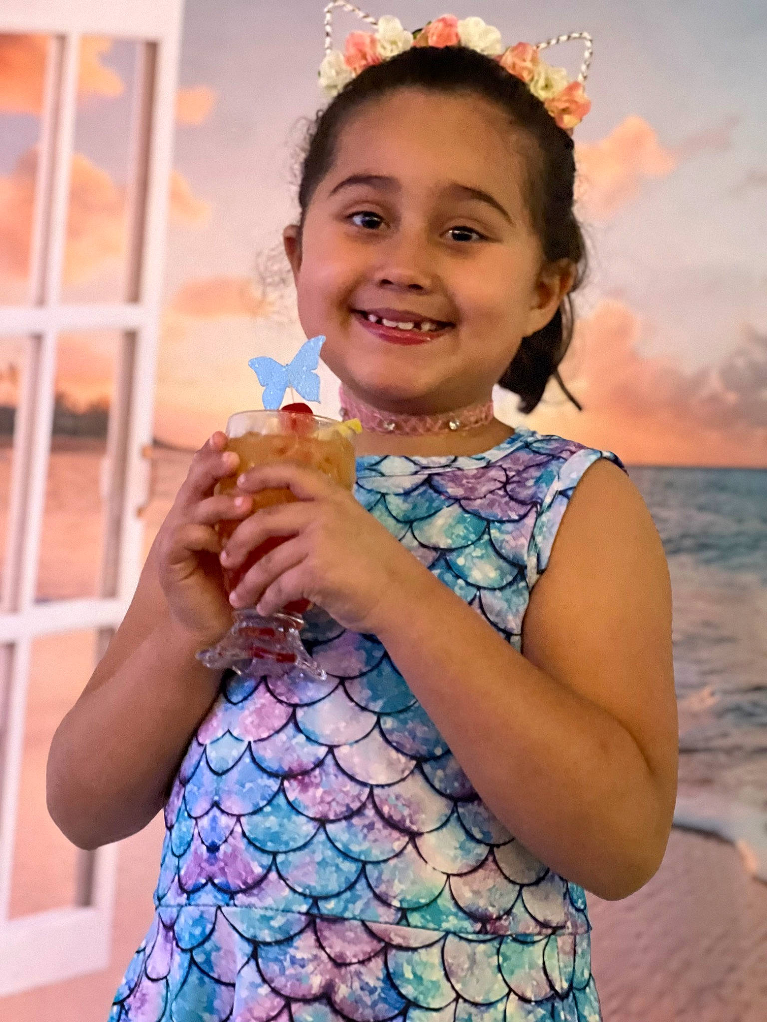 Leilani is registered to the contest to win money with this photo: arm, azure, child, day_dress, dress, electric_blue, fashion_accessory, fashion_design, flash_photography, formal_wear, fruit, fun, gesture, happy, jewellery, joy, pattern, person, skin, sky