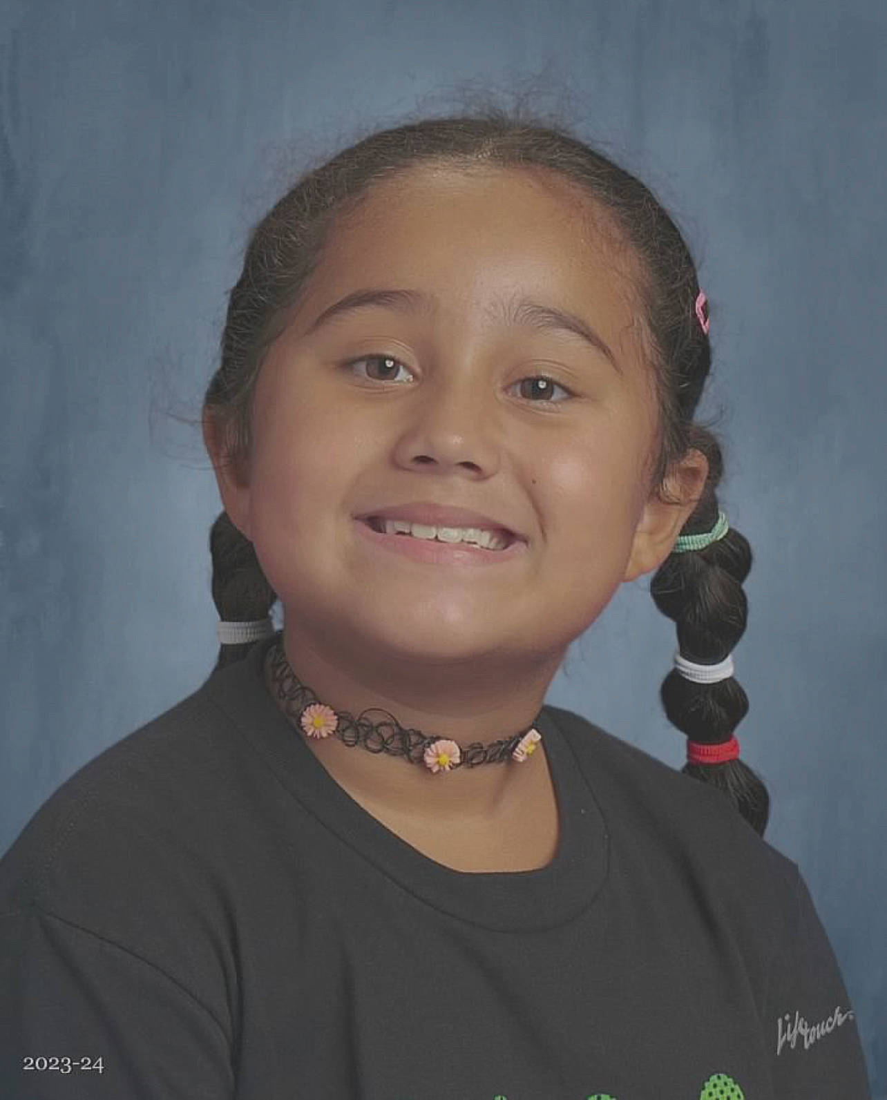 Leilani is registered to the contest to win money with this photo: audio_equipment, cheek, child, chin, ear, earrings, eyebrow, eyelash, flash_photography, forehead, fun, hairstyle, happy, human_body, iris, joy, lip, microphone, neck, nose