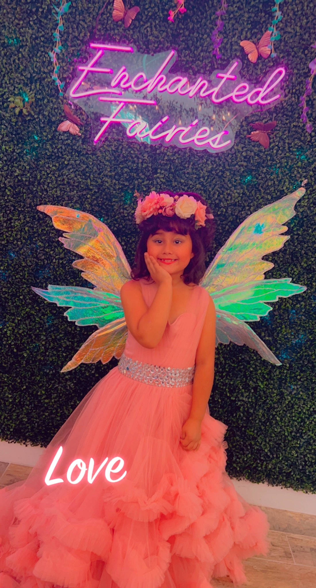 Leilani is registered to the contest to win money with this photo: angel, beauty, costume_design, event, fashion_accessory, fashion_design, fictional_character, fun, happy, headpiece, headwear, illustration, joy, magenta, mythical_creature, peach, person, petal, pink, poster