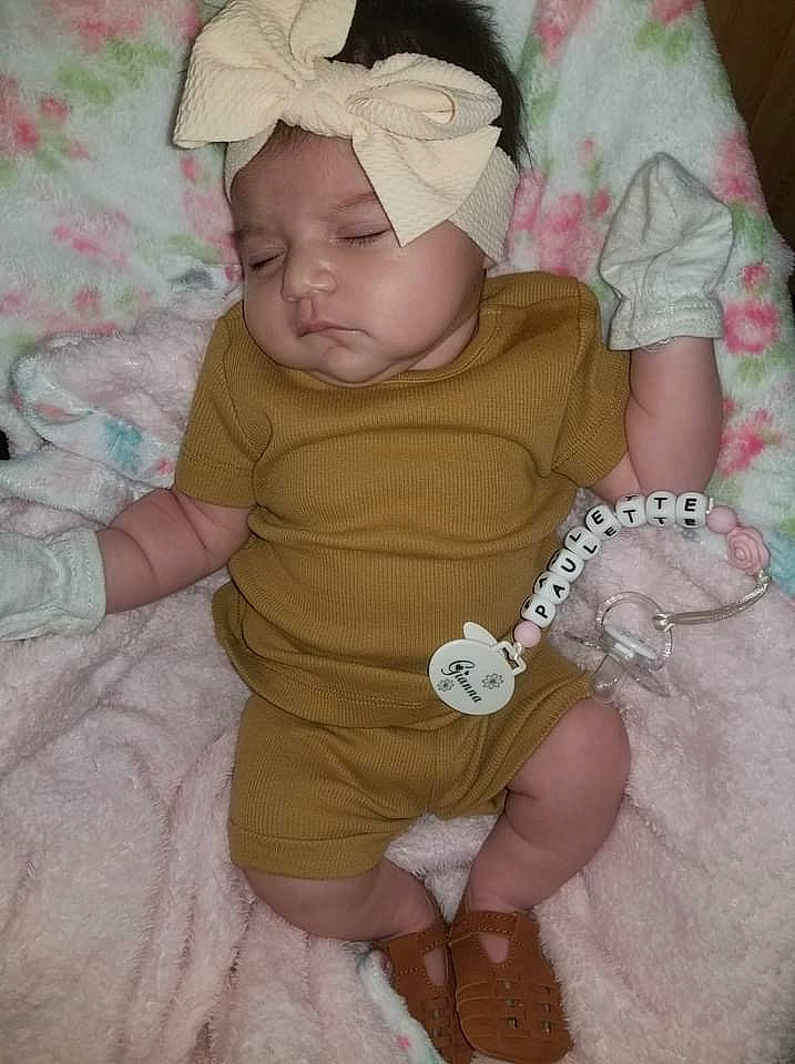 Gianna joined the competition — help win amazing prizes! baby, baby_products, baby_toddler_clothing, beanie, cap, cheek, child, comfort, eye, face, fashion_accessory, glasses, headgear, headwear, pattern, person, pink, sitting, skin, sleeve