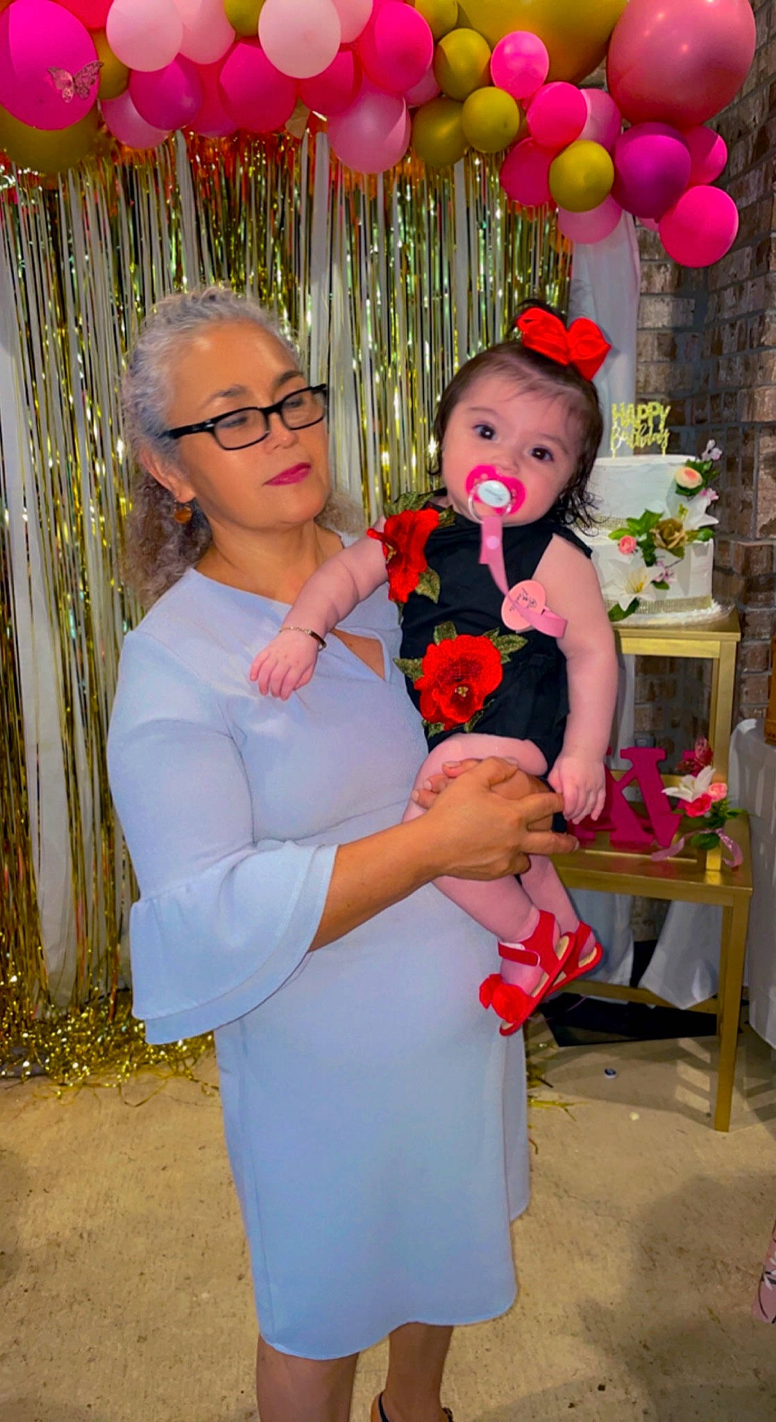 Gianna is registered to the contest to win money with this photo: balloon, beauty, child, event, flower_arranging, formal_wear, fun, happy, leisure, magenta, orange, peach, people, person, photograph, pink, plant, red, toddler, wedding_ceremony_supply