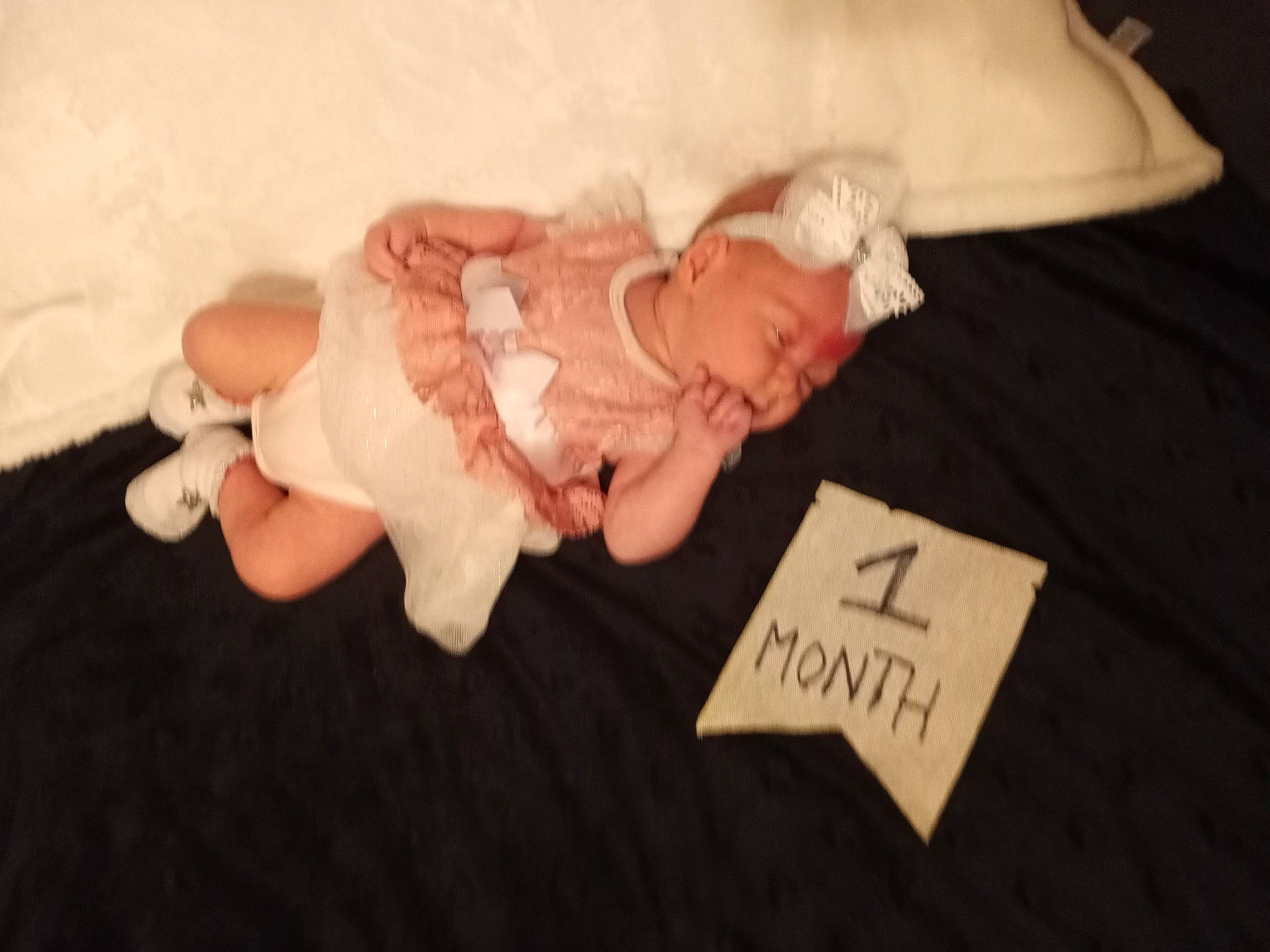 Kyra is registered to the contest to win money with this photo: baby, baby_products, baby_toddler_clothing, cheek, child, embellishment, handwriting, peach, person