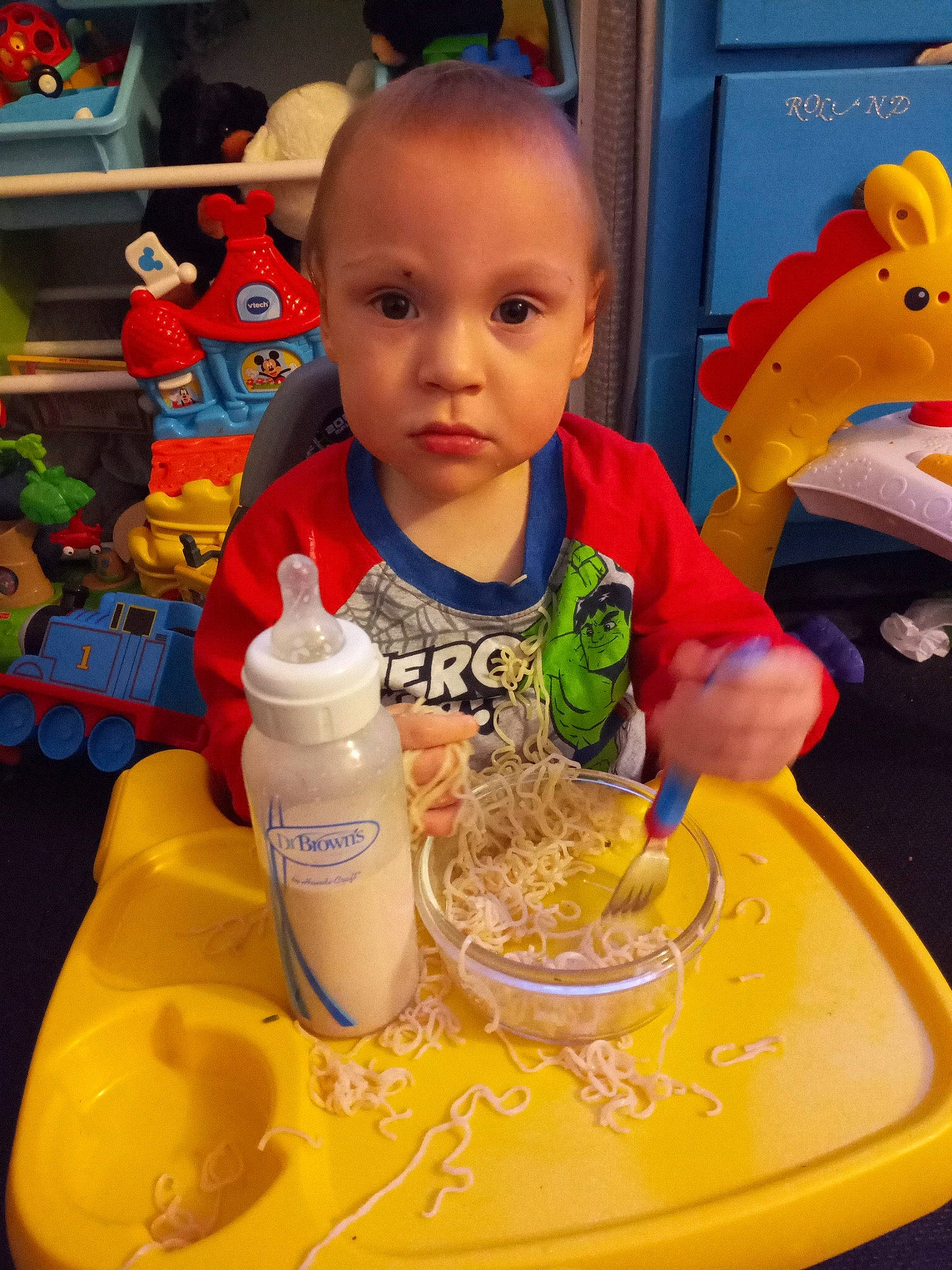 Jameson is registered to the contest to win money with this photo: baby, baby_bottle, baby_products, baby_toys, bottle, bottle_cap, drinkware, person, plastic, plastic_bottle, shelf, toy