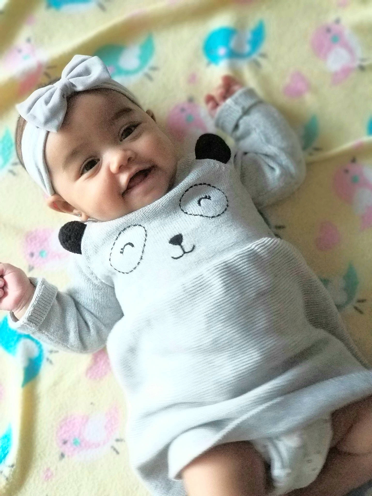 Aoife is registered to the contest to win money with this photo: baby, baby_products, baby_toddler_clothing, cheek, child, person, pink, product, skin, sleeve, smile, toddler