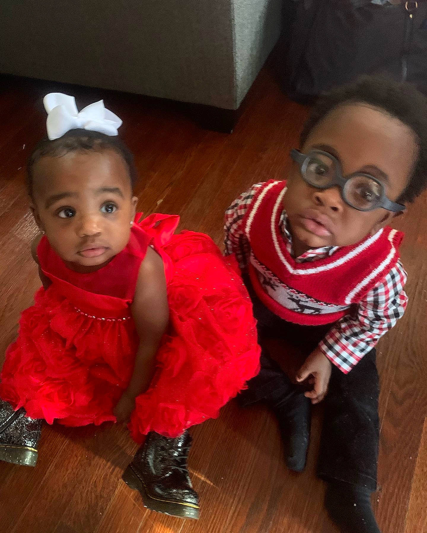 Sevyn is registered to the contest to win money with this photo: baby_toddler_clothing, child, cool, costume_hat, event, eyewear, floor, flooring, fun, happy, hardwood, headband, headpiece, pattern, people, person, sitting, skin, snapshot, toddler