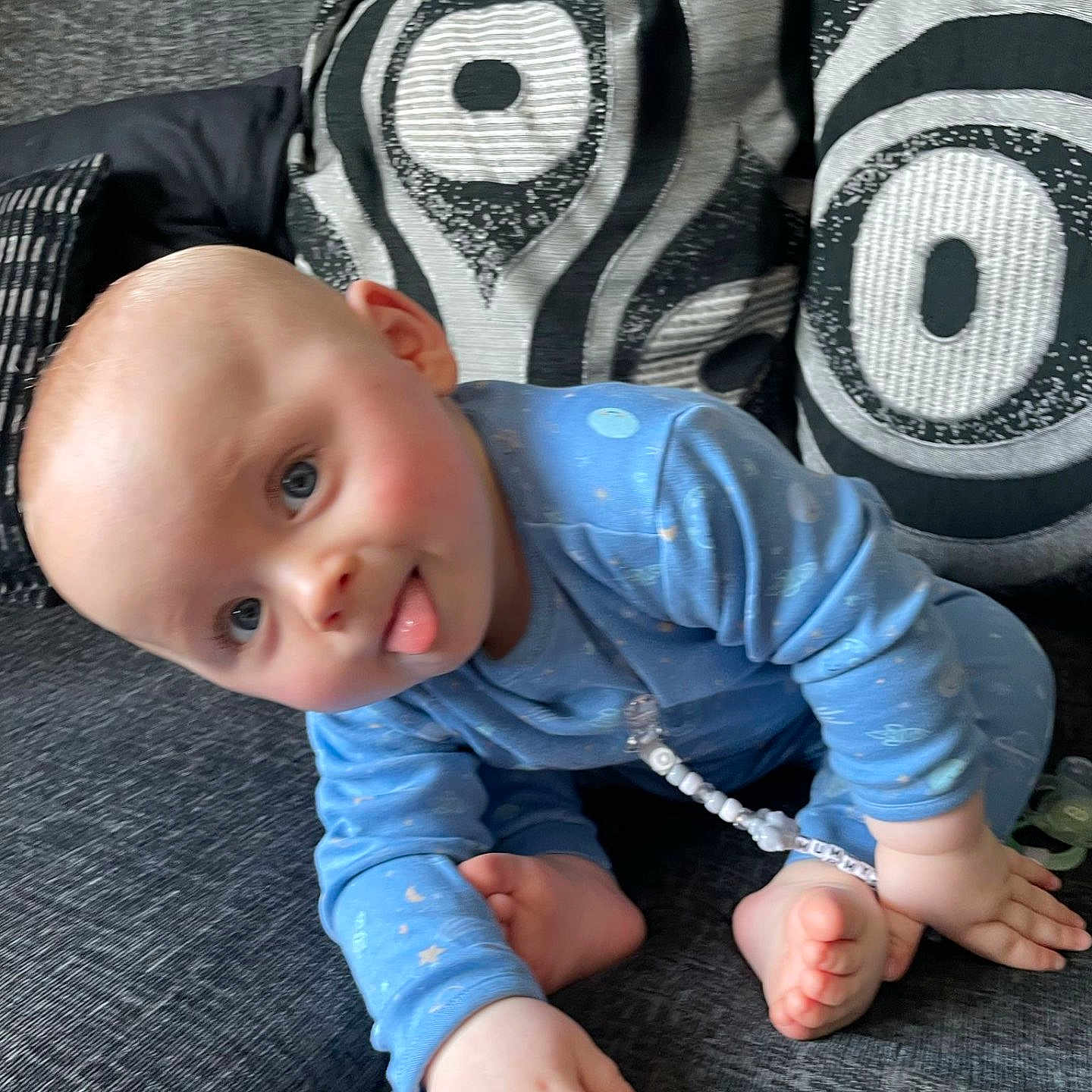 Karter-Keith is registered to the contest to win money with this photo: baby, blade, clothing, couch, crawling, cushion, dagger, face, furniture, head, homedecor, jeans, knife, pants, person, photography, pillow, portrait, sitting, weapon