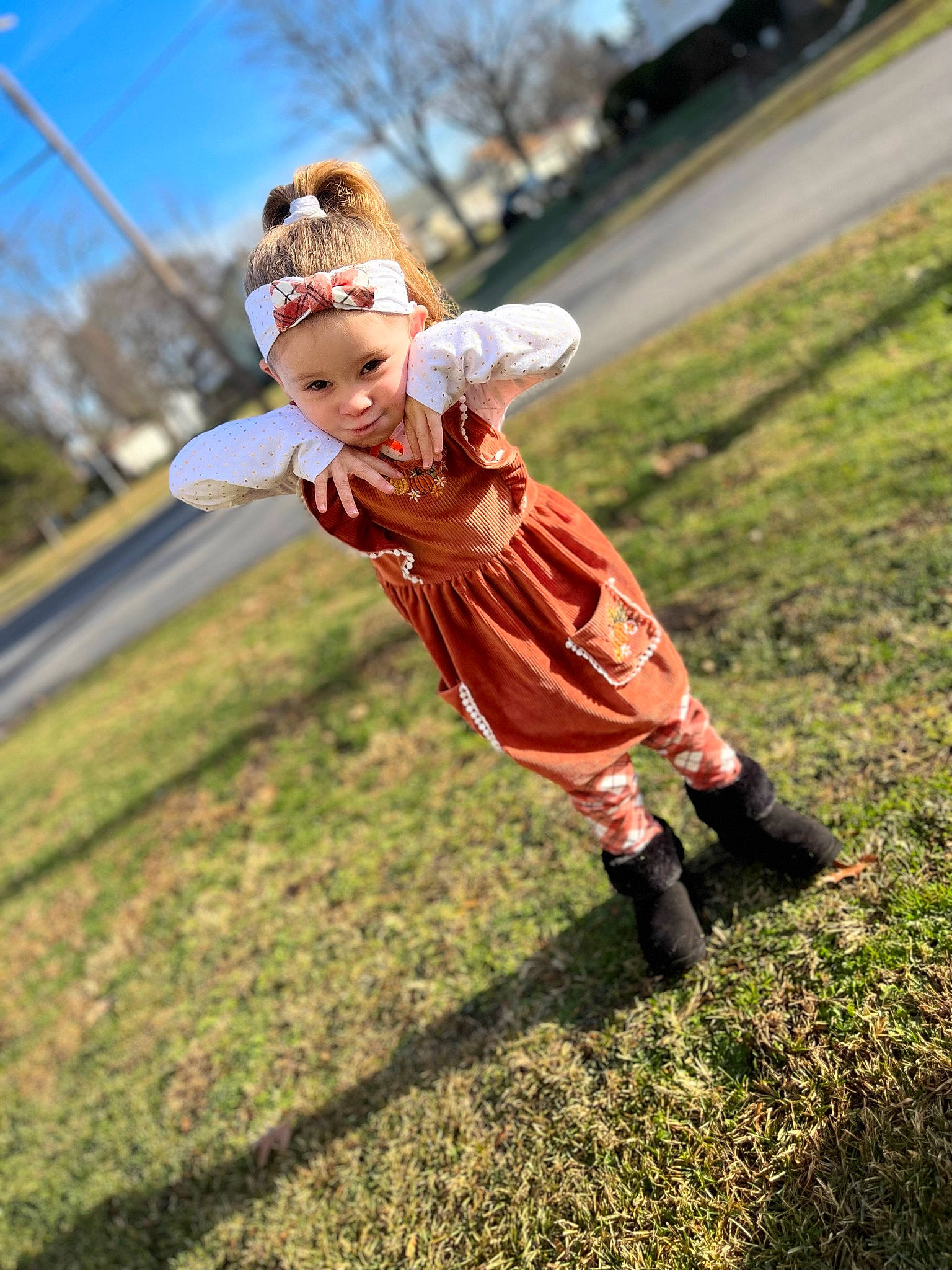 Mckenzie is registered to the contest to win money with this photo: ball, child, flash_photography, fun, grass, grassland, happy, hat, headwear, human_leg, landscape, leisure, people_in_nature, person, plant, play, recreation, sky, soil, toddler
