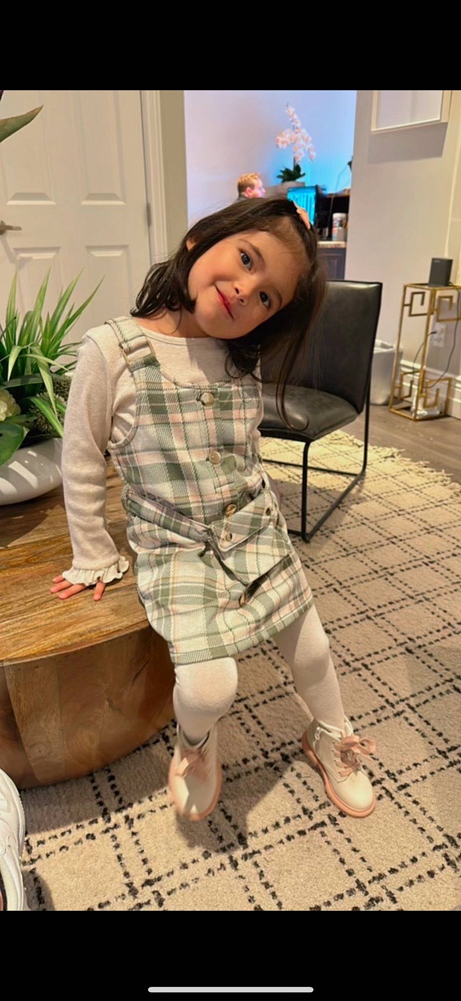 Alexia joined the competition — help win amazing prizes! dress, dress_shirt, eye, floor, flooring, flowerpot, hairstyle, happy, houseplant, joint, joy, knee, person, plaid, plant, shoe, shoulder, sleeve, smile, tartan