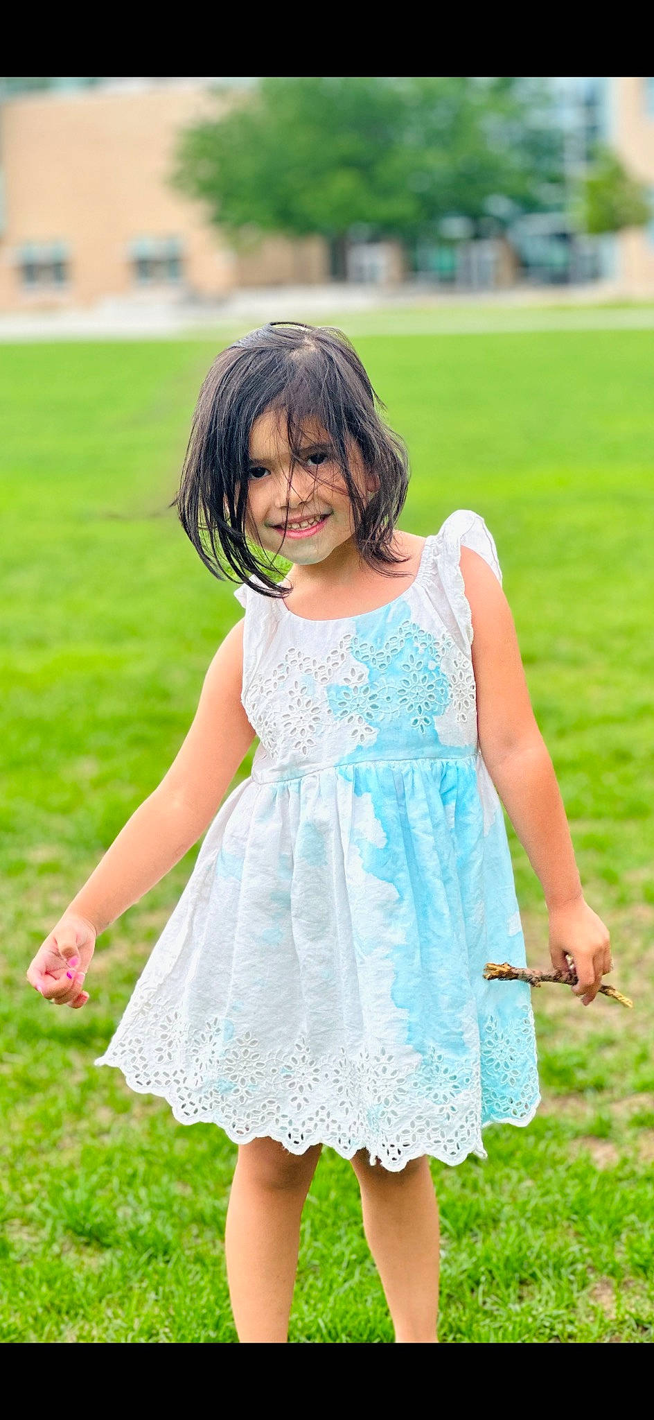 Alexia is registered to the contest to win money with this photo: baby_toddler_clothing, day_dress, dress, formal_wear, fun, grass, grass_family, grassland, happy, joy, lawn, long_hair, meadow, one_piece_garment, people_in_nature, person, plant, recreation, skin, summer