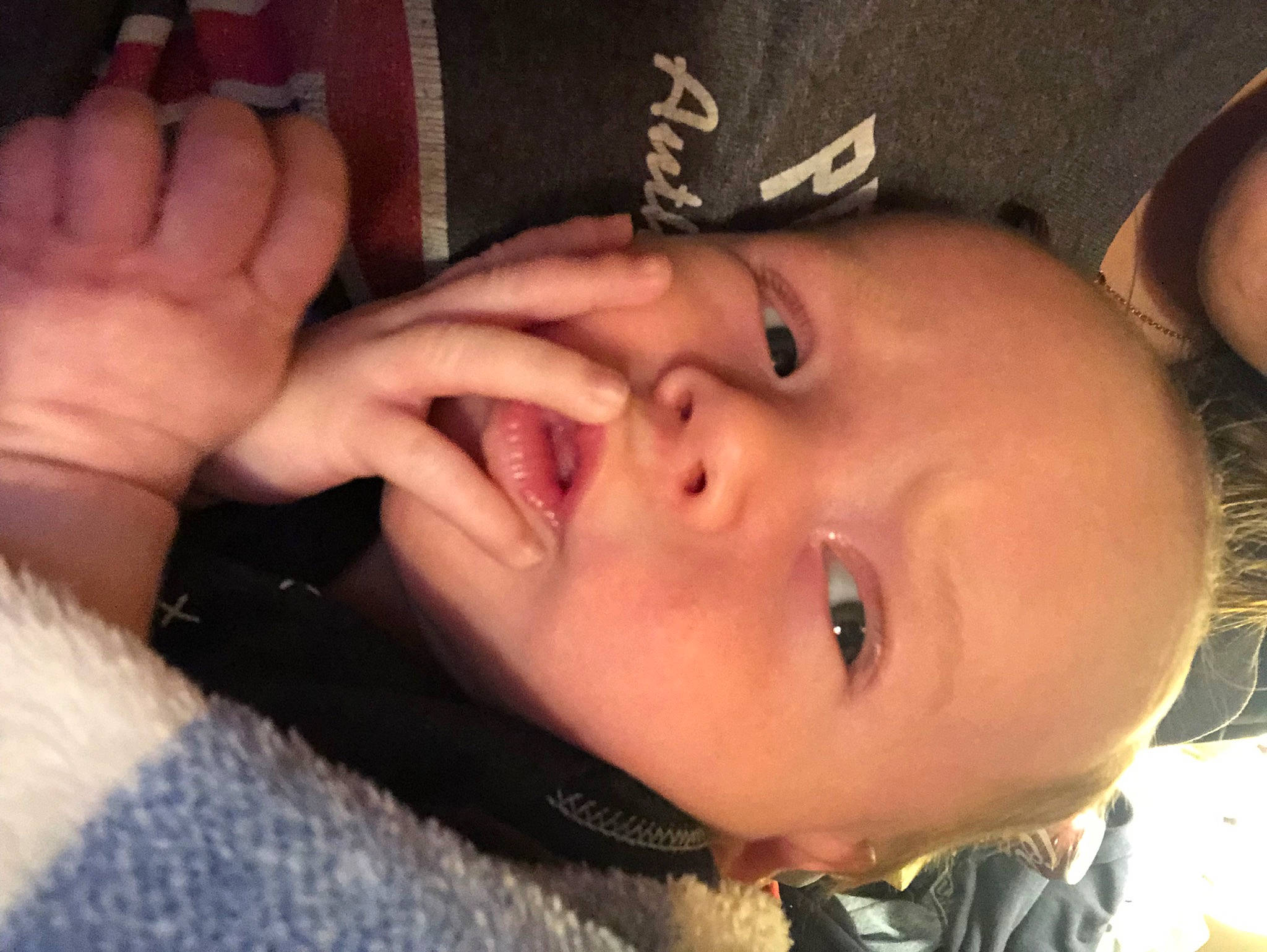 Kenai is registered to the contest to win money with this photo: baby, baby_toddler_clothing, cheek, close_up, ear, eyebrow, eyelash, finger, forehead, gesture, happy, human_body, iris, lip, mouth, neck, nose, person, skin, smile