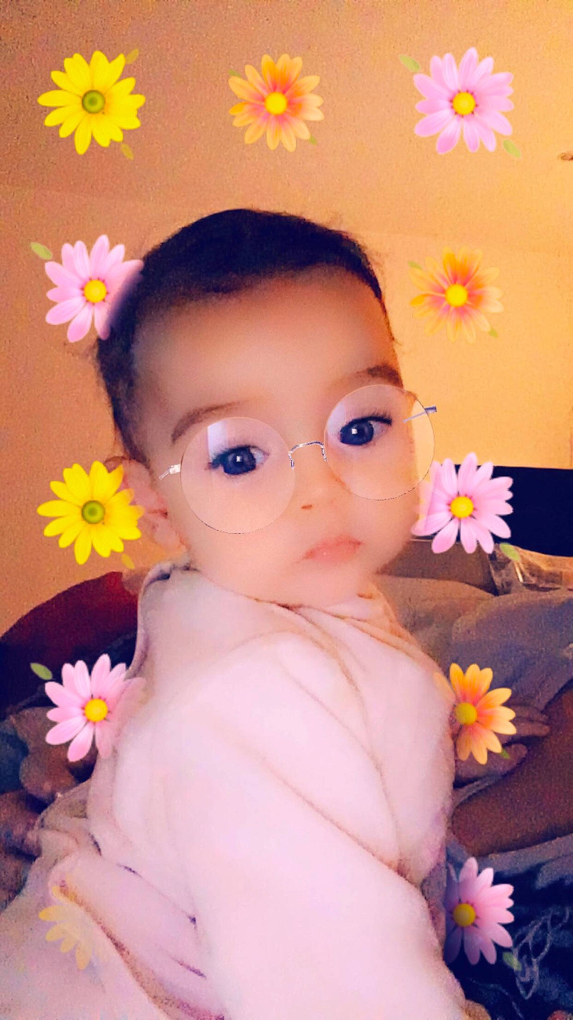 Bianca a rejoint le concours — aidez-le/la à gagner de superbes lots ! cheek, child, doll, eye, face, flower, forehead, girl, hair_accessory, head, human_hair_color, infant, iris, nose, person, petal, pink, skin, smile, toddler