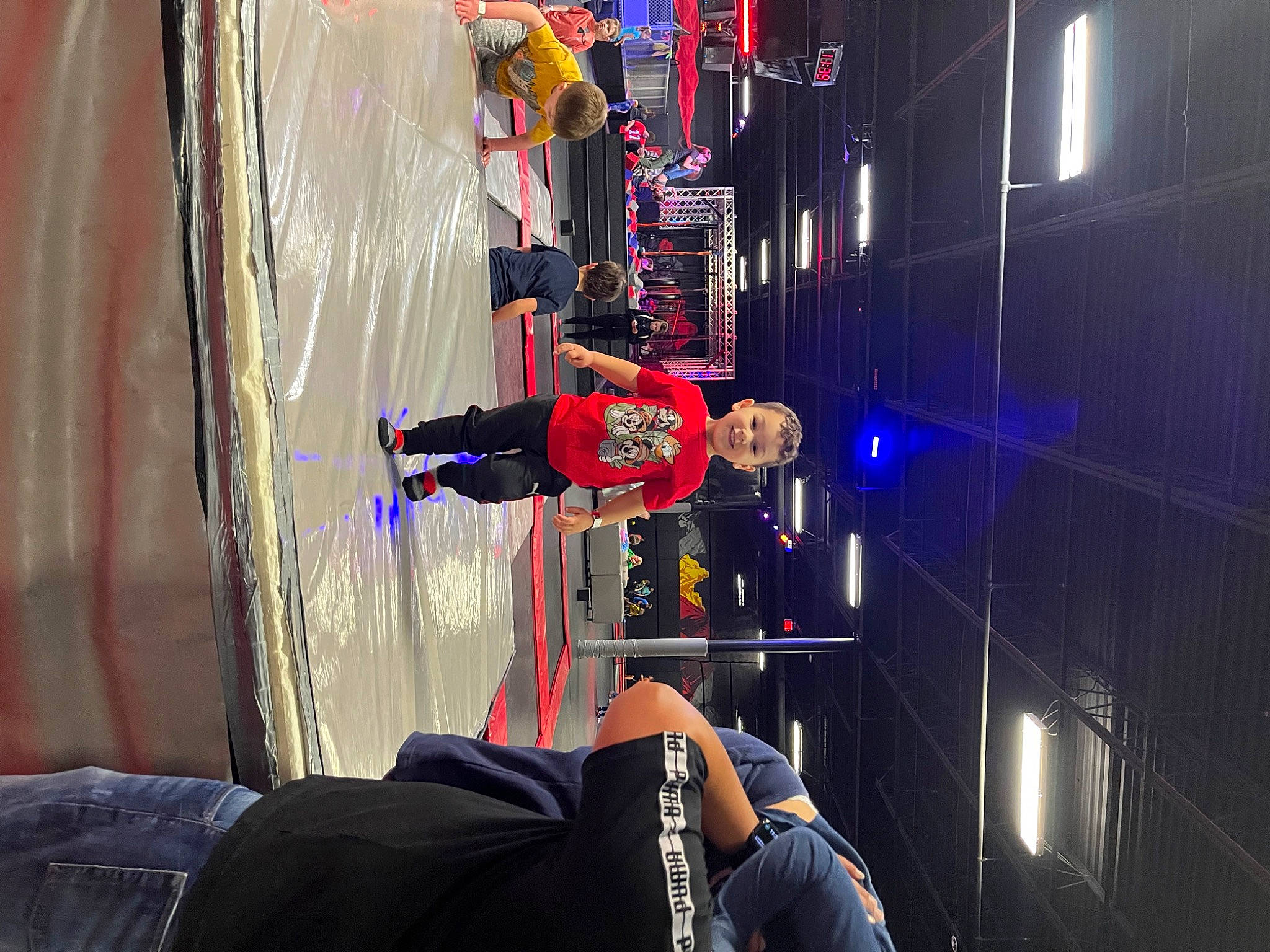 Gabriel joined the competition — help win amazing prizes! carmine, competition, competition_event, electric_blue, engineering, entertainment, event, footwear, fun, games, hat, joy, leisure, machine, magenta, performance, person, purple, recreation, room