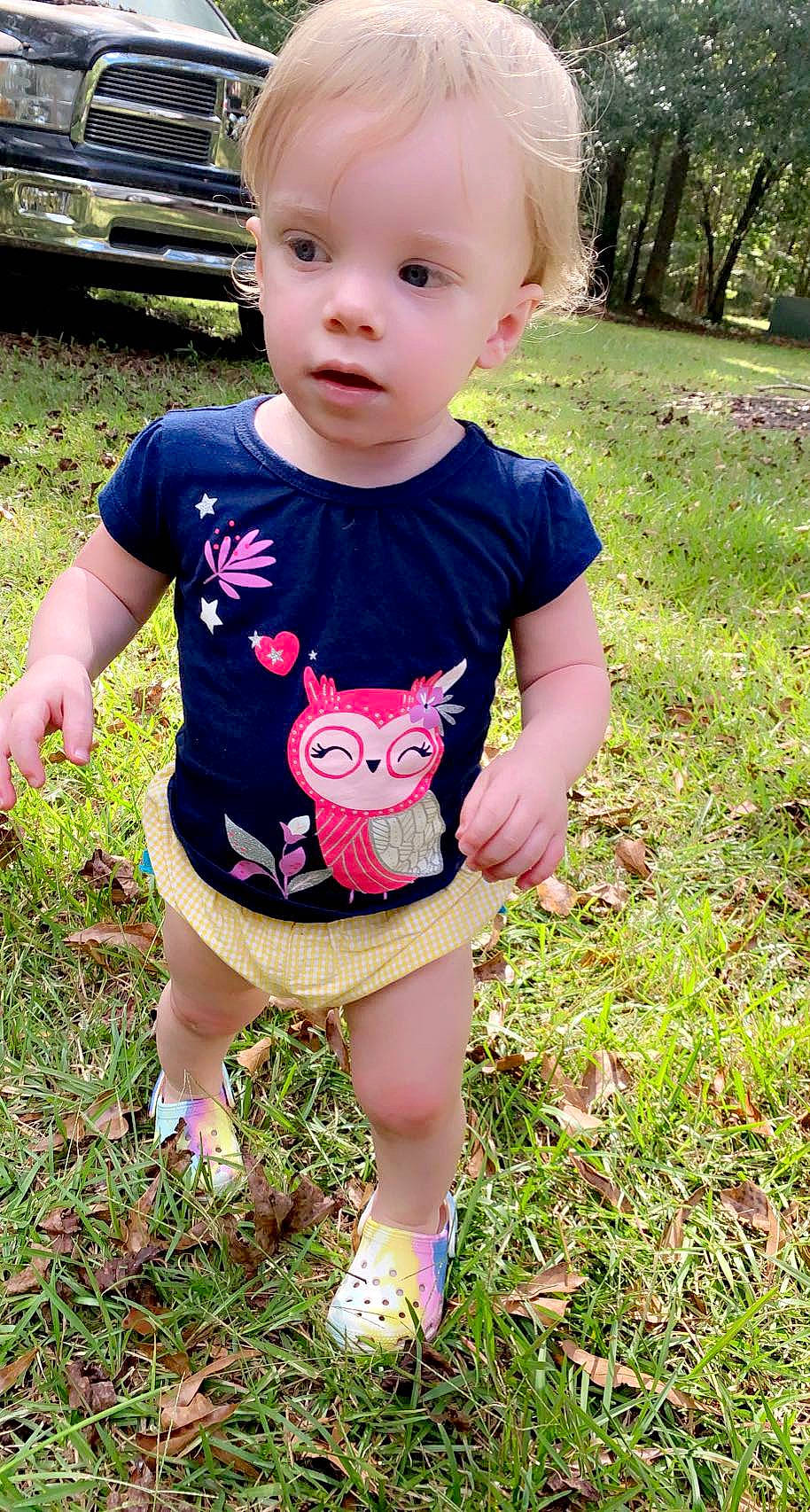 Channing joined the competition — help win amazing prizes! baby, baby_toddler_clothing, blond, botany, child, fun, grass, green, happy, leaf, pattern, people_in_nature, person, pink, plant, shorts, skin, sleeve, summer, t_shirt