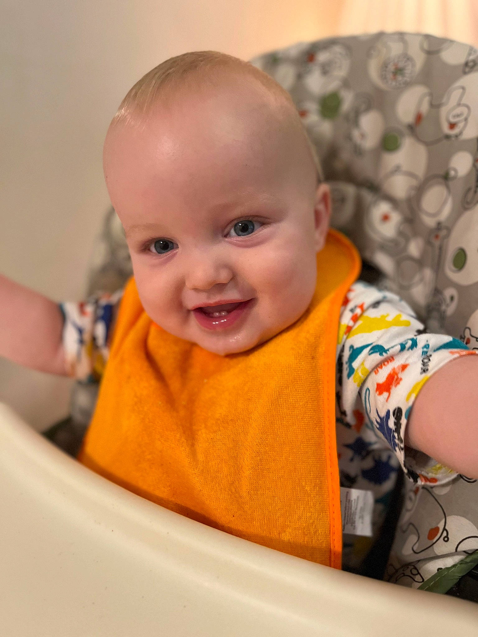 Bryce is registered to the contest to win money with this photo: baby, baby_toddler_clothing, cheek, chin, eye, eyebrow, hairstyle, happy, iris, mouth, neck, nose, outerwear, person, product, skin, sleeve, smile, t_shirt, textile
